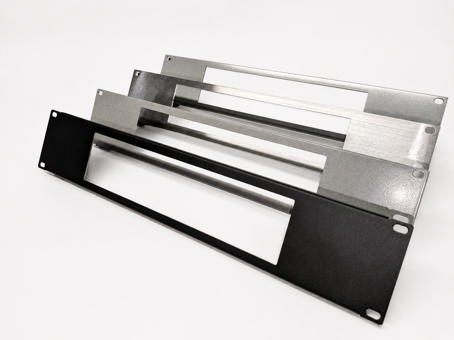 Four finish options of the custom 2RU Waveshare rack panel: black steel, silver steel, brushed aluminium, and silver aluminium